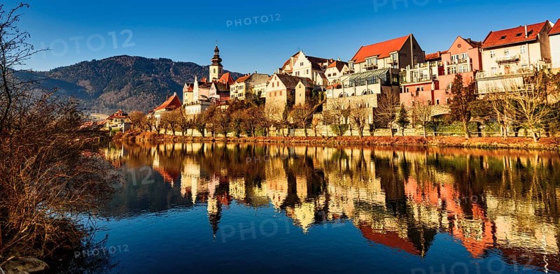Frohnleiten panorama small city above Mur river in Styria, Austria. View at Parish church, town and river Mur. Famous travel destination