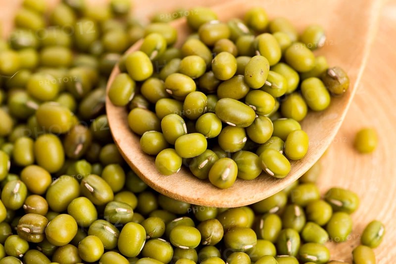 Mung beans over wooden spoon, lodz, poland