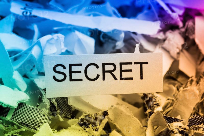 Paper shreds with the keyword Secret, symbolic photo for data destruction, banking secrecy and industrial espionage Austria