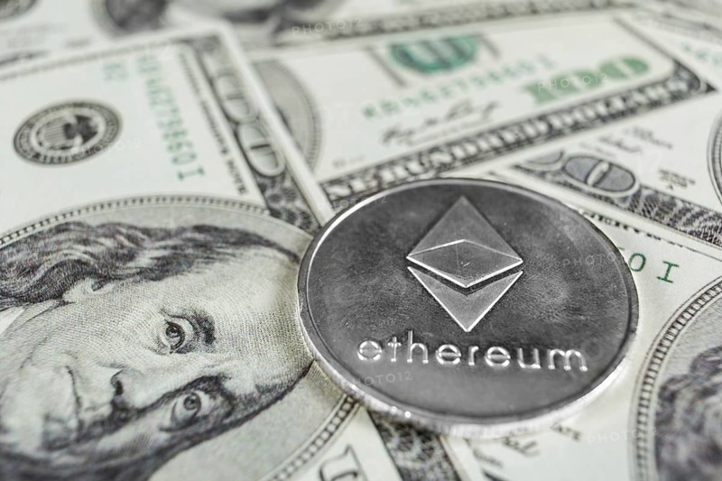 Silver Ethereum macro photo on hundred dollars bills