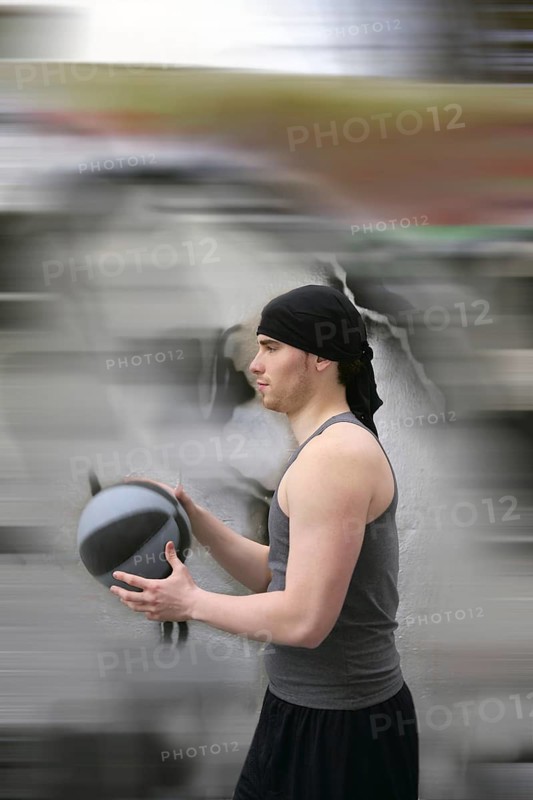 Active motion street basket player ball blur background