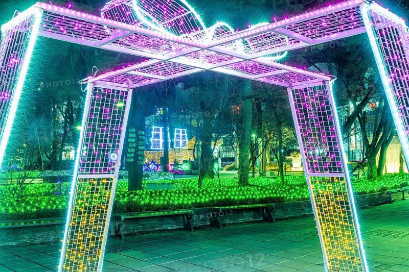 Taebeck, South Korea. January 29, 2019: Structure resembling wrapped gift made of lights on display downtown during winter festival