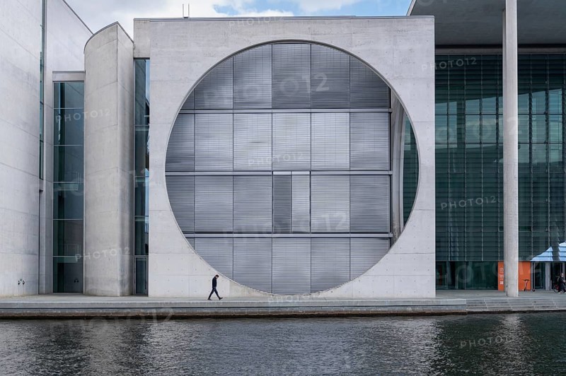 23.04.2024, Berlin, Germany, Europe, View from the west of the futuristic Marie-Elisabeth-Lüders-Haus on the banks of the Spree in Berlin's Mitte district, designed by German architect Stephan Braunfels, Europe