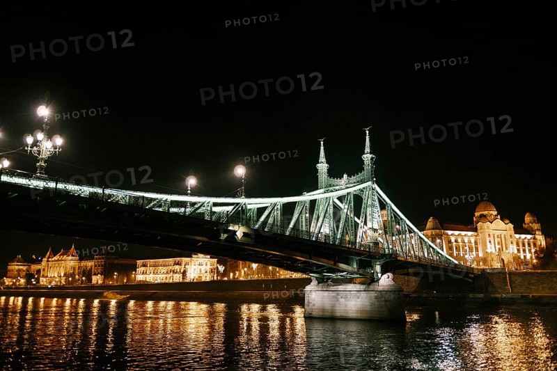 Night illumination of the Freedom Bridge in Budapest.