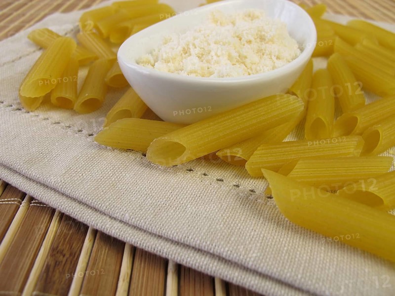 Gluten-free penne pasta and grated cheese