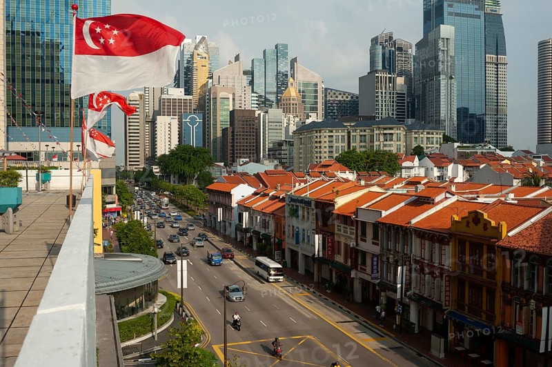 19.07.2018, Singapore, Republic of Singapore, Asia, A view from above of Singapore's Chinatown district and the skyscrapers of the business district in the background, Asia