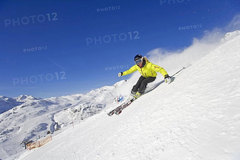 Skier in action, blonde woman, 25, 30, years, downhill skiing, Austria, Europe