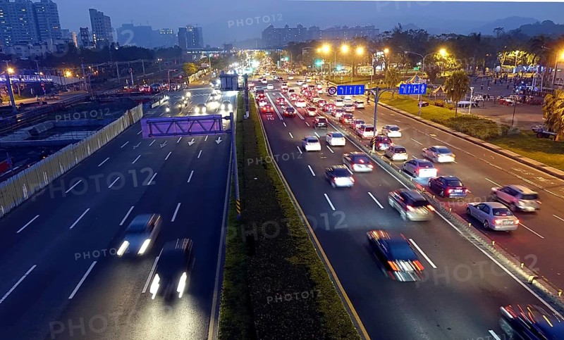 Dense traffic at evening rush hour on a main street in Kaohsiung, Taiwan, Asia