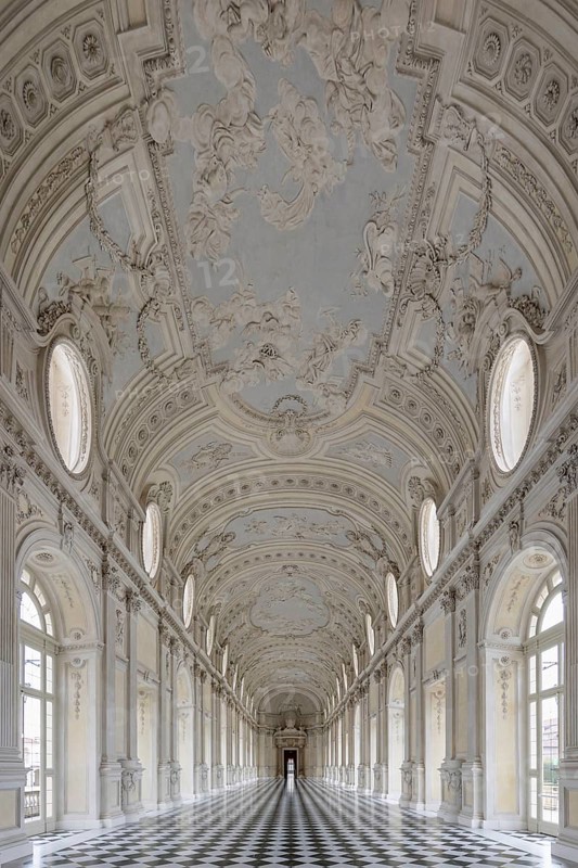 Magnificent, bright baroque corridor with ornately decorated ceiling, Palace of Venaria Reale, residences of the House of Savoy, Turin, Piedmont, Italy, Europe
