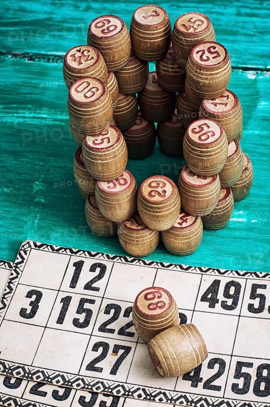 Traditional legacy of the ancient Board game Lotto on wooden background
