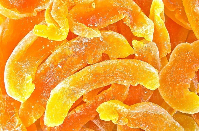 Texture of dried candied melon slices