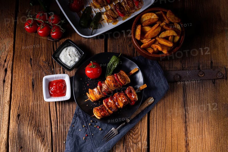 Marinated kebabs with meat and vegetables