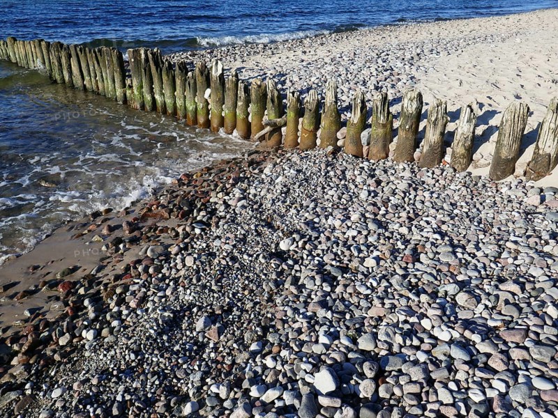 Old groynes on the pebble beach