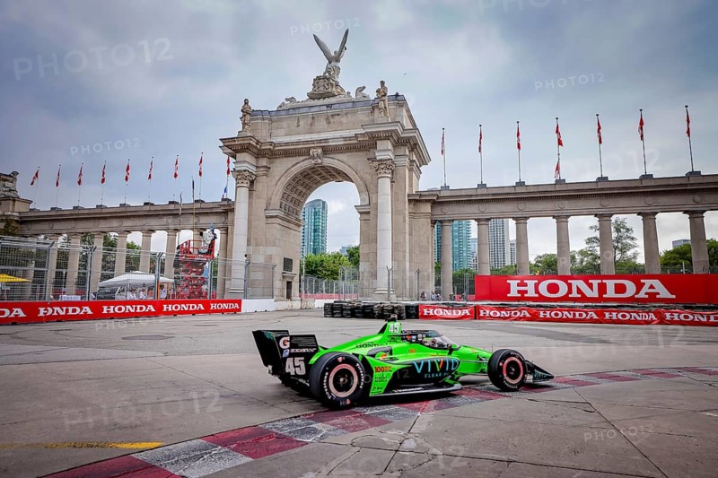 CHRISTIAN LUNGAARD (45) of Hedensted, Denmark celebrates in victory lane after winning the Honda Indy Toronto in Toronto, ON, CAN