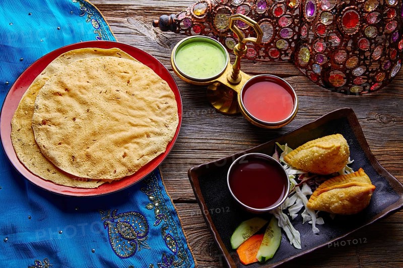 Samosa with Papadam indian recipe red and green sauces samoosa or sambusa