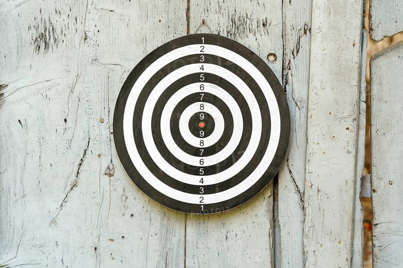 An image of an old dart board