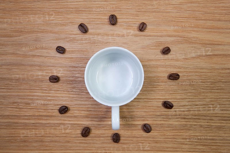 Coffee Time - Empty coffee cup and clock of coffee beans