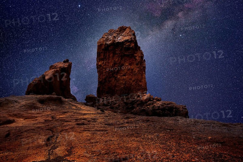 Gran canaria roque nublo in night stars light photo mount
