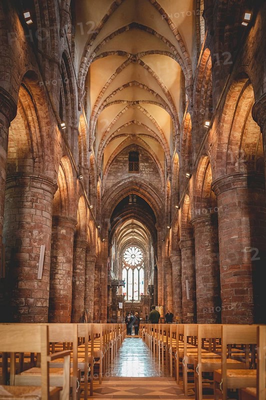 Illuminated Inside of St Magnus Cathedral at Kirkwall, Scotland, vertical shot