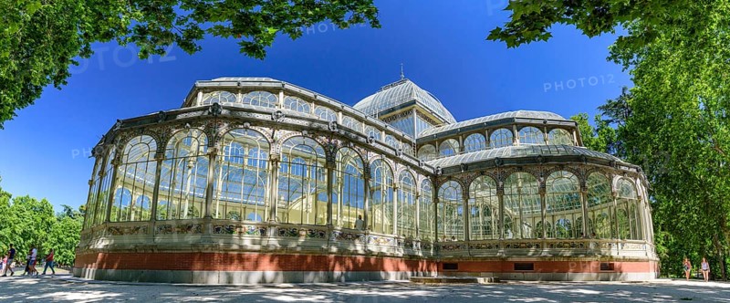 Panorama of Palacio de Cristal (Glass Palace) in Buen Retiro Park in Madrid, Spain, Europe