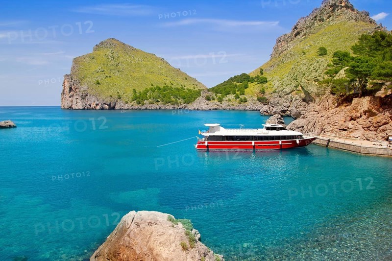 Escorca Sacalobra beach in north Mallorca with boat in balearic Spain