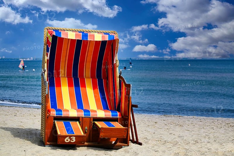Beach chairs on Timmendorfer Strand on the Baltic sea with blue sky