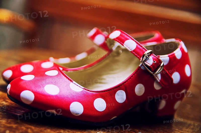 Red dance shoes with white dots
