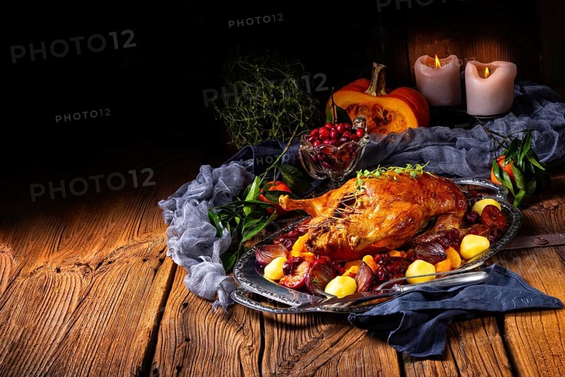 Delicious duck roasted with thyme and apple