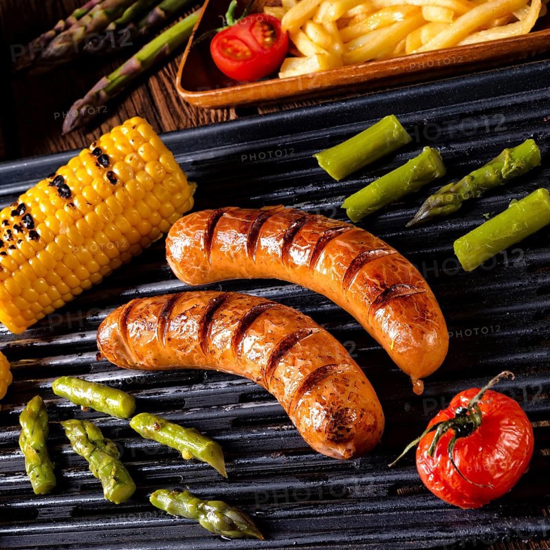 Grilled krakauer with french fries and green salad