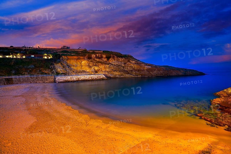 Llanes Playa del Sablon beach sunset in Asturias of Spain