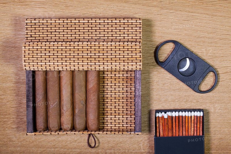 Luxury Cuban cigars on the wooden table