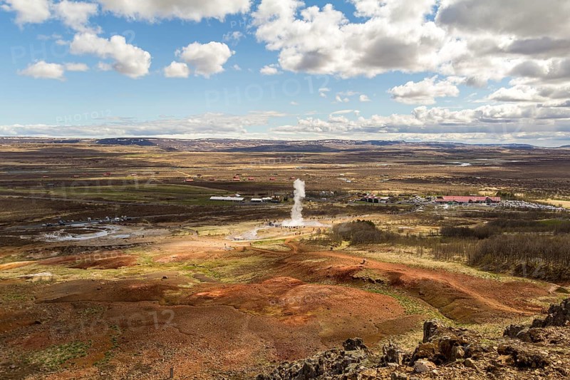 View on Geyser valley, Haukadalur geyser erupting