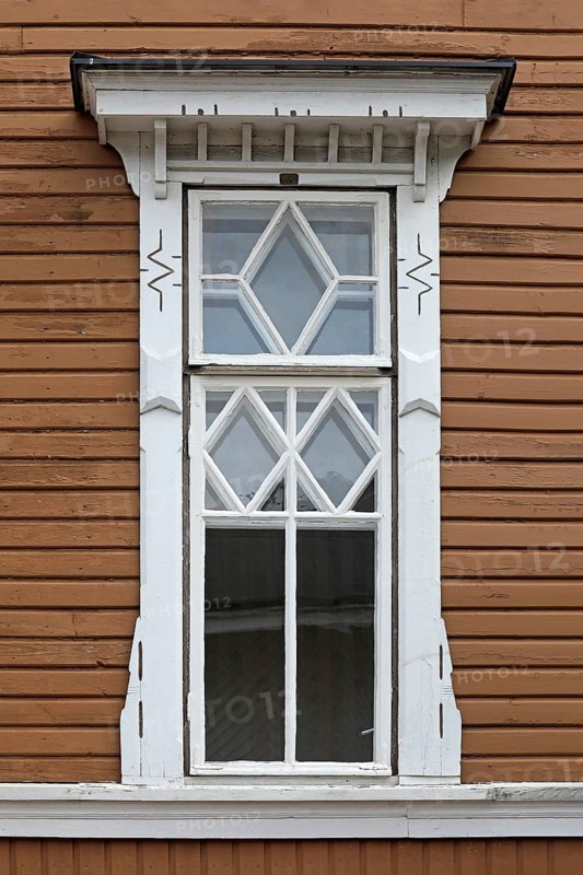 Kärki building or Kärjen talo, 1905, by Otto Dahl represents beautiful early 1900s wooden architecture. Detail of window frame. Salo, Finland. 2020