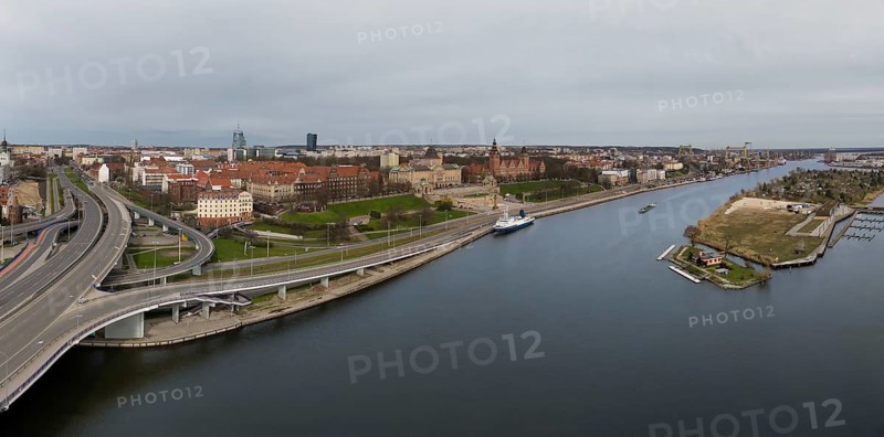 Aerial view of Chrobry Shafts, moored ships on the Oder River and castle like buildings of National Museum, Szczecin, Poland, Europe