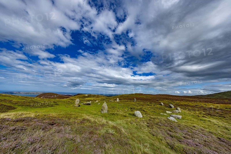 Druids Circle, stone circle in wide landscape with pastures in the mountains, Penmaenmawr, Dwygyfylchi, Caernarfonshire, Conwy County Borough, Wales, Great Britain