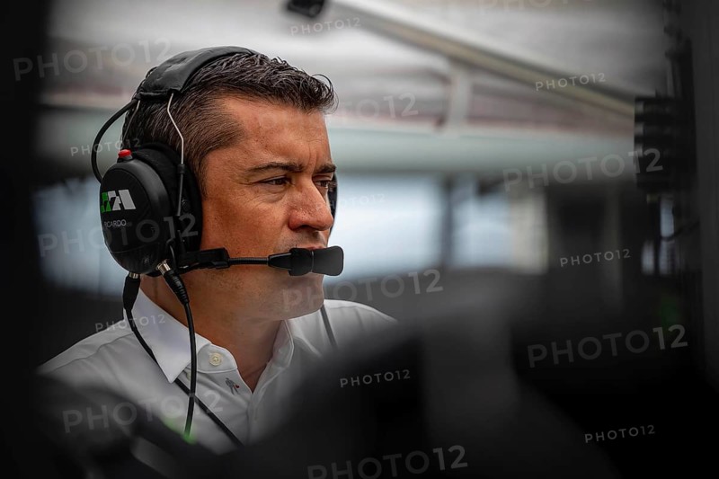 INDYCAR team owner, RICARDO JUNCOS, watches his team work on their Juncos Hollinger Racing car before a practice session for the Indianapolis 500 at Indianapolis Motor Speedway in Indianapolis, IN, USA, North America