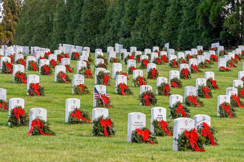 Atop a hill, a veterans cemetery with white headstones and the American flag evokes deep honour, sacrifice, and enduring national pride, Salisbury, United States of America