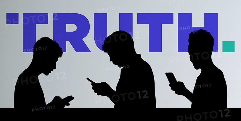 Business people using smartphone background Truth social media