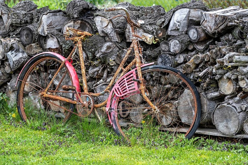 A bicycle was forgotten and has not been used for a long time