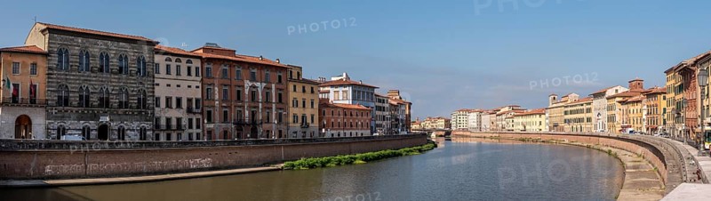 Old picturesque houses at the Arno river waterfront in Pisa, Italy, Europe