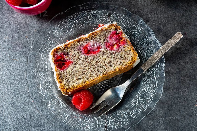 Poppy seed cake with raspberries and desiccated coconut