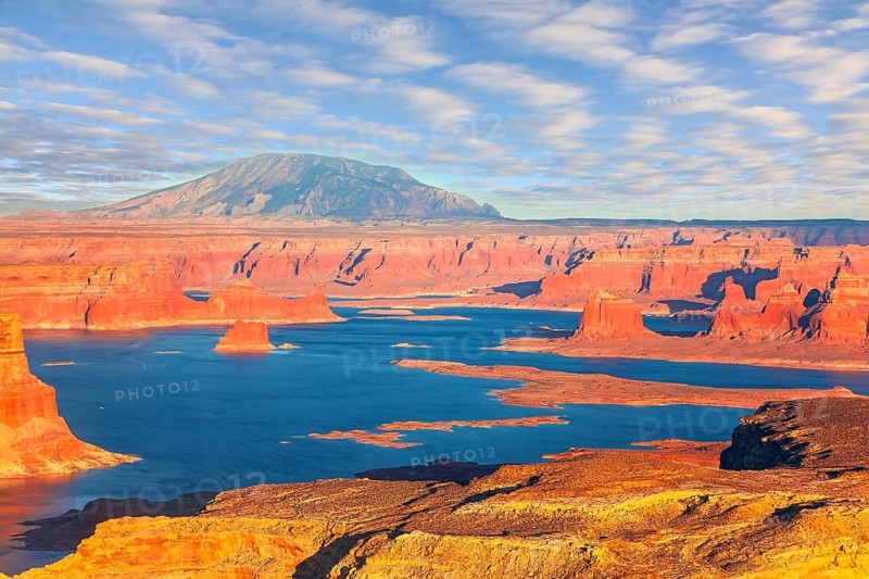 States of Utah and Arizona. USA. Lake Powell is a reservoir on the Colorado River. Huge lake of among the red sandstone cliffs. The coast is cut by narrow canyons. The photos were taken from the plane