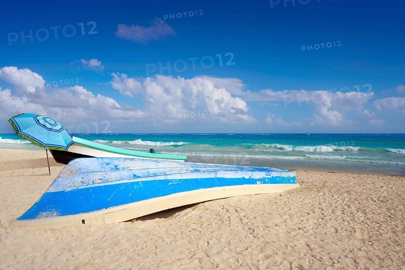 Tulum Caribbean turquoise beach boat in Riviera Maya of Mayan Mexico