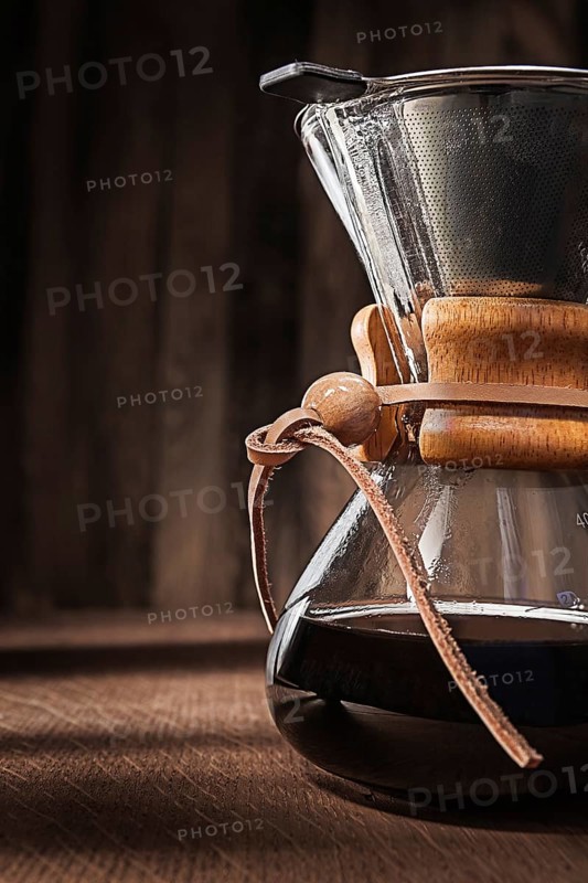 Alternative Method To Make Delicious Flavoured Coffee. Glass Coffee Dripper. Hot Fresh Brewed Flavoured Coffee. Close Up View