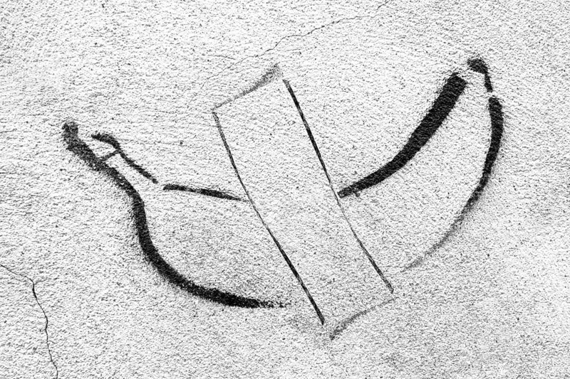 Banana graffiti on concrete wall. Backround with copy space