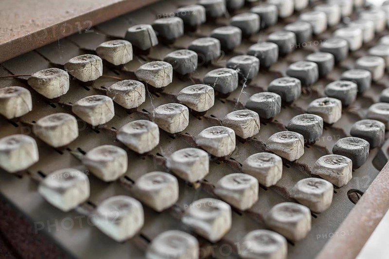 Details of an old keyboard on industrial machine of the late nineteenth century