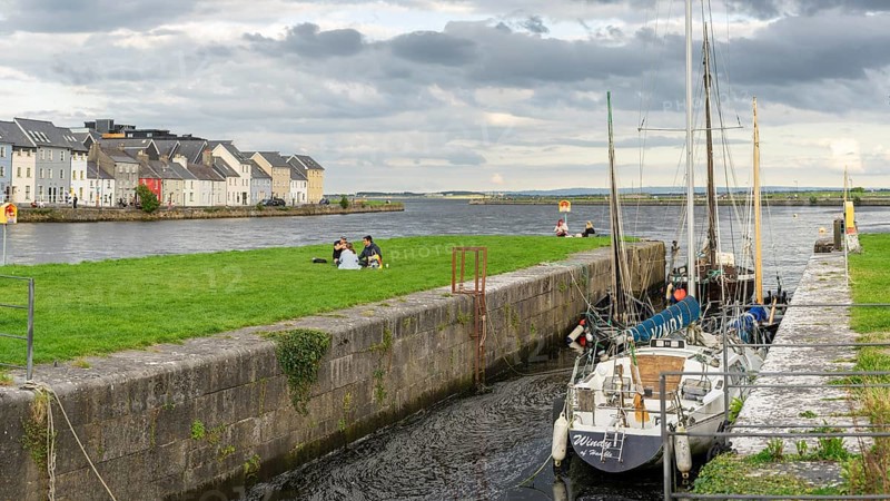 Boat anchored in Eglinton Canal Sea Lock, The Long Walk, Galway, Ireland, United Kingdom, Europe
