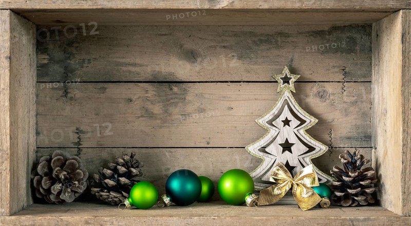 Some green glass balls and fir tree Christmas symbols decoration