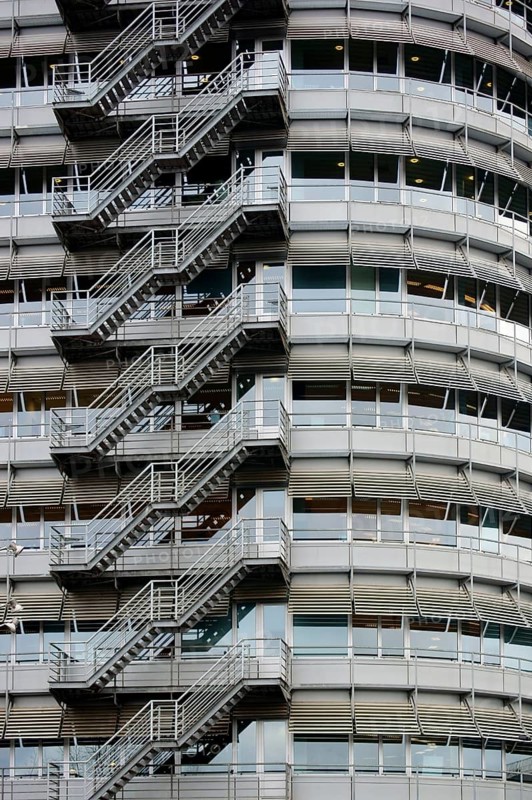 An accessible external staircase on a metal office building