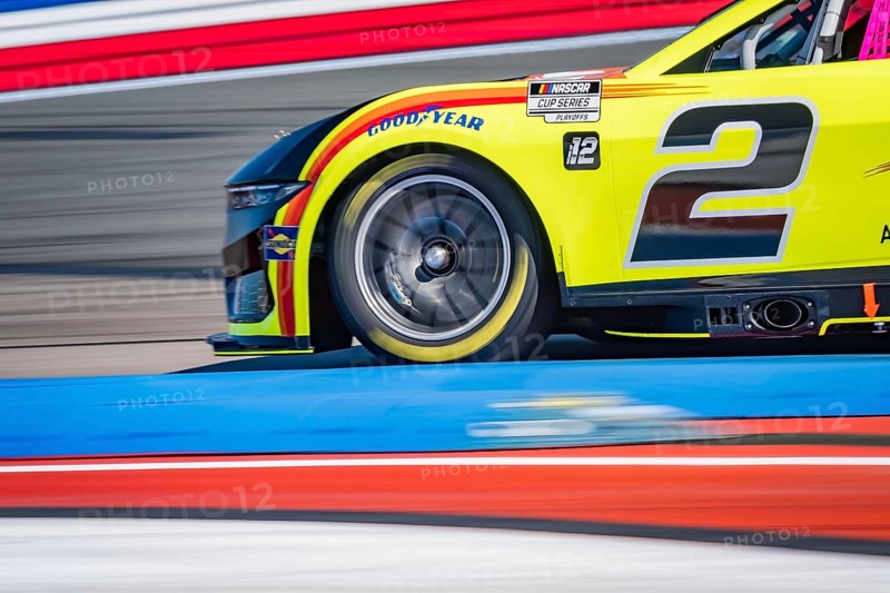NASCAR Cup Series driver, AUSTIN CINDRIC (2), races through the turns during a practice session for the Bank of America ROVAL 400 at Charlotte Motor Speedway Road Course in Concord, NC, Concord, United States of America